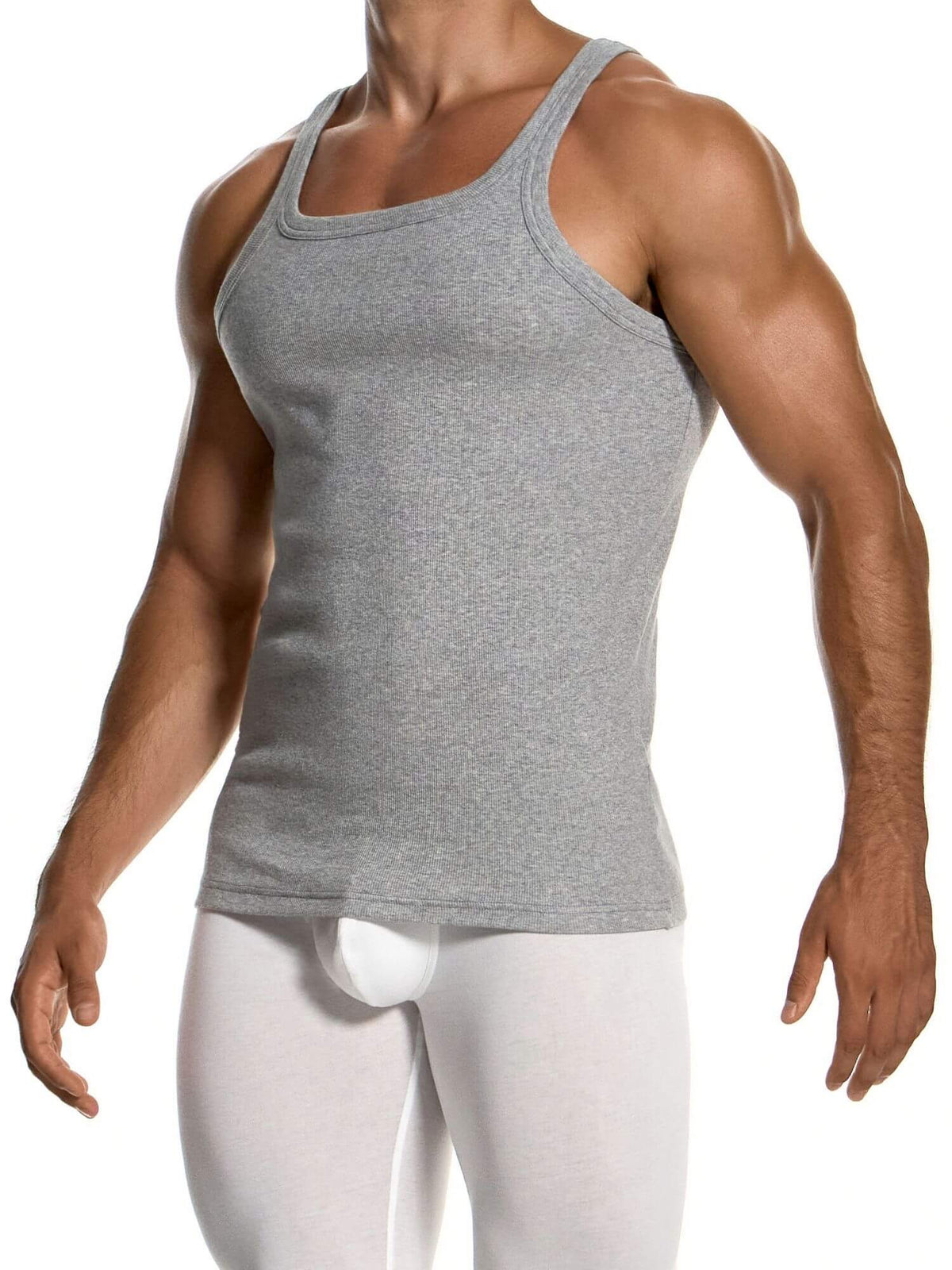 A muscular man wearing a heather gray ribbed tank top and white compression pants, shown from the neck down against a plain white background.