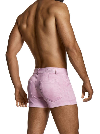Person wearing light pink mini shorts on a white background