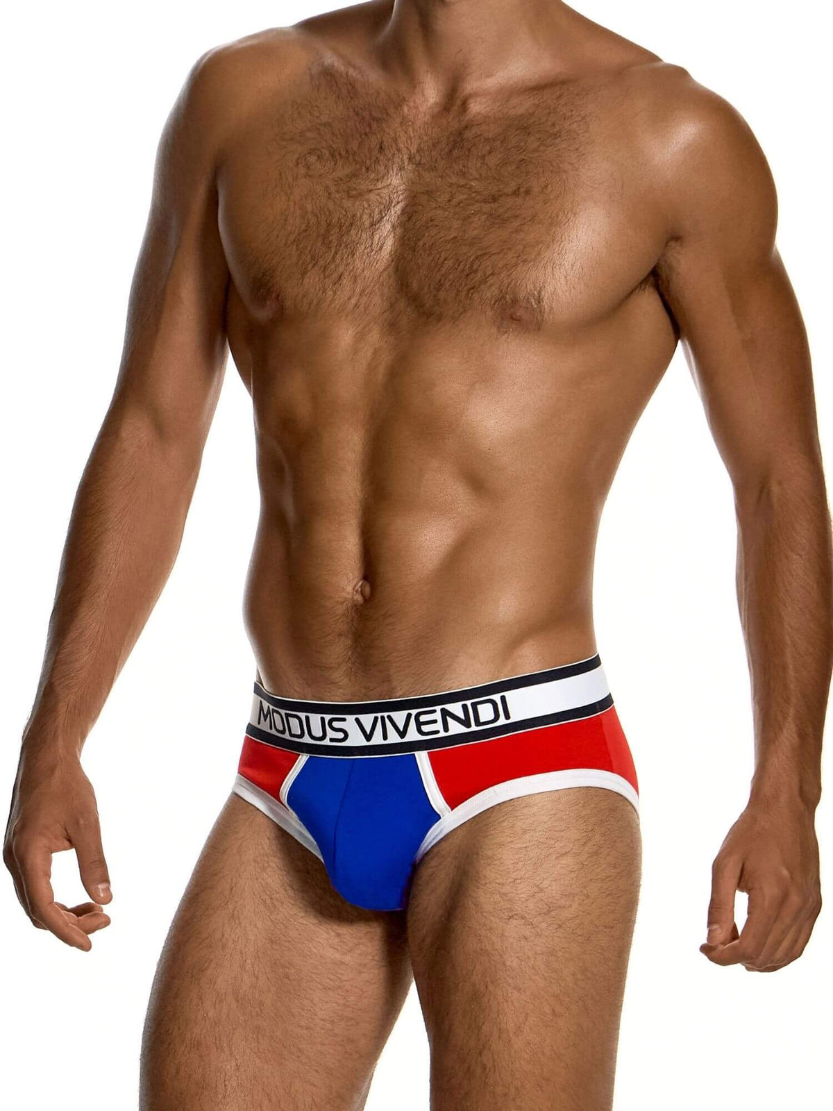 A shirtless male model wearing low-rise briefs with a red, white, and blue design and a black waistband featuring the brand name 'MODUS VIVENDI'.