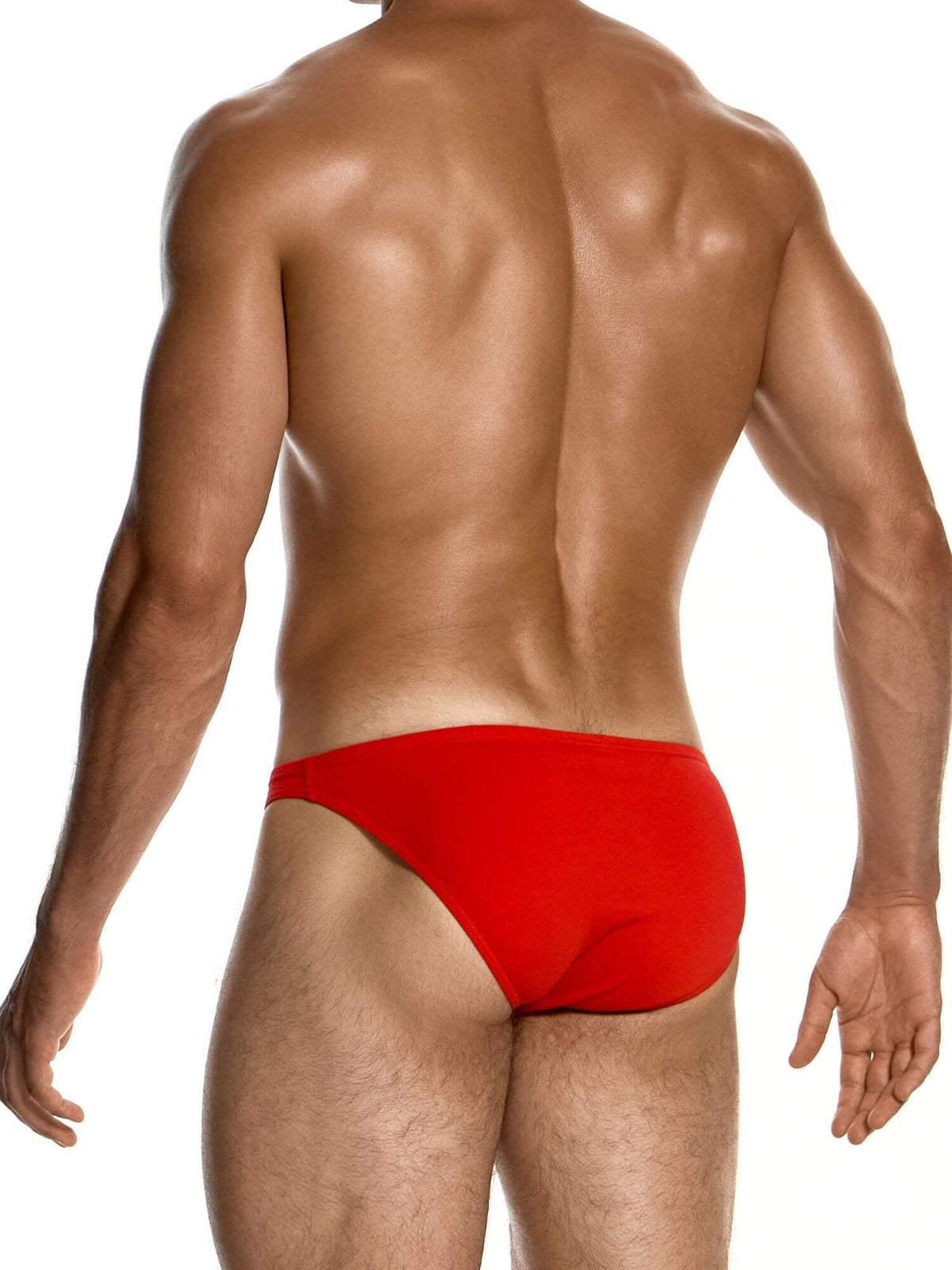 Rear view of a muscular man wearing bright red men's briefs against a plain white background.