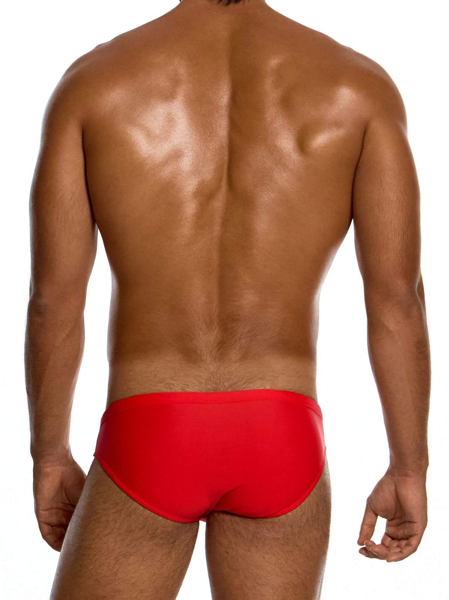 Red swim brief worn by a person on a white background