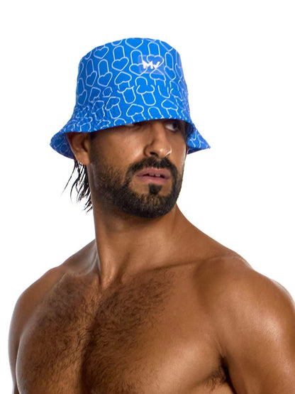 Man wearing a blue bucket hat with a white logo on a white background