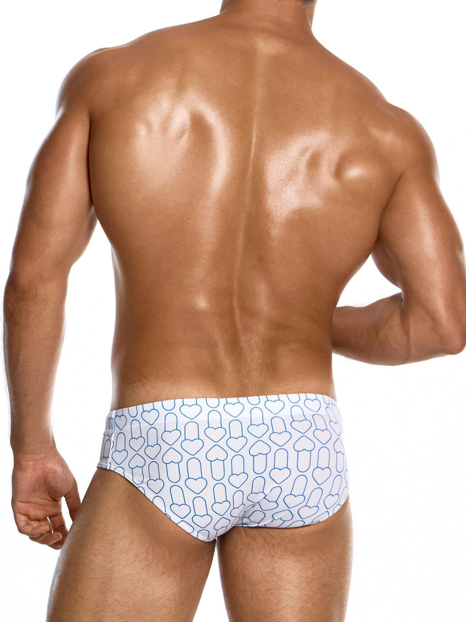 Man wearing a patterned swimming brief on a white background