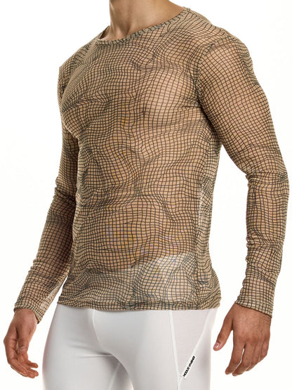 Person wearing a long-sleeve patterned shirt with a white background