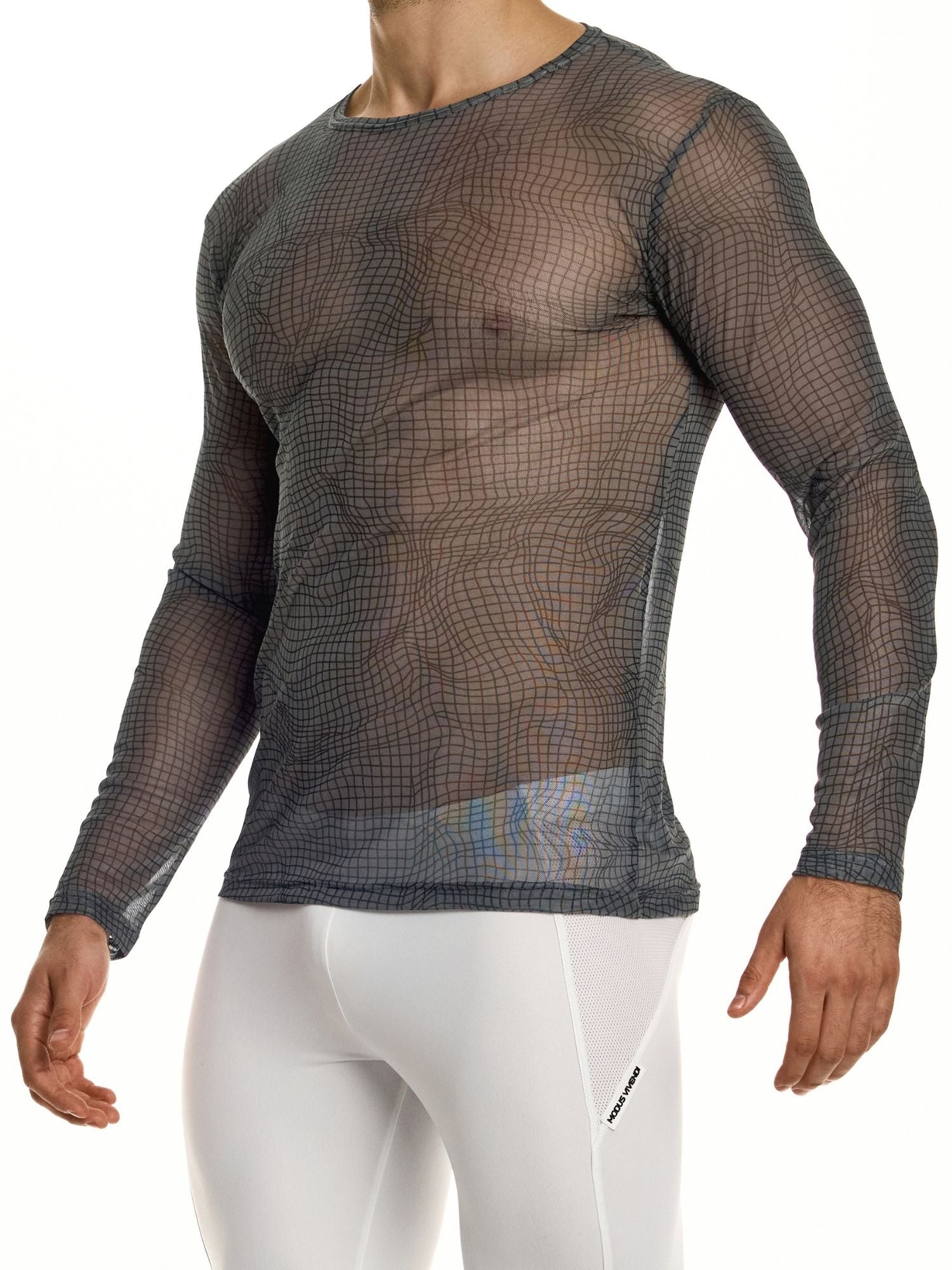 Person wearing a sheer long-sleeve shirt over white pants on a white background