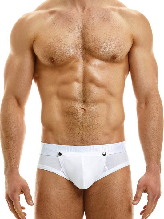 This image features a male model wearing the Modus Vivendi Hole Bottomless Brief, available in classic black, white, or grey colorways. The brief is designed with a backless style and a removable pouch, which is fastened with metal poppers and can be fully removed for a crotchless look.