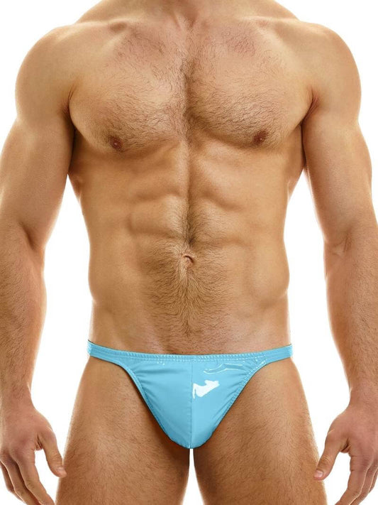 A man wearing a pink PVC thong with a low-rise elasticated waistband and a metallic 'Modus Vivendi' tag on the back.