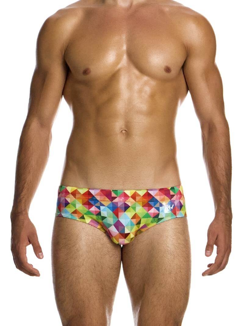 A model wearing a multicolored geometric patterned swim brief by Modus Vivendi