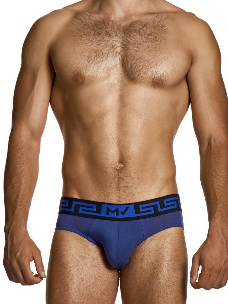 Man wearing a blue men's underwear with a brand logo on a white background