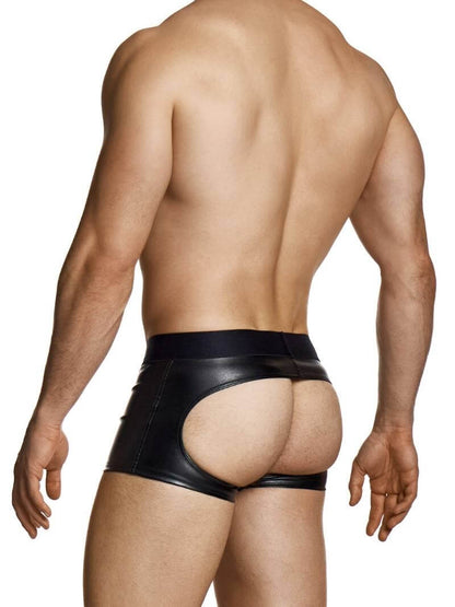 Man wearing a black leather thong on a white background