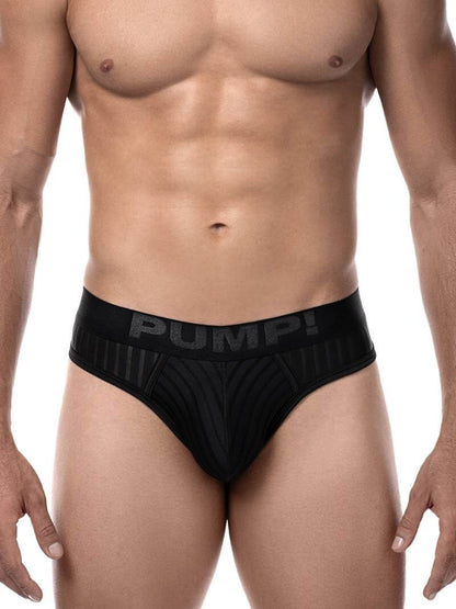 This image features the PUMP! Whisper Thong, showcasing a minimalist design ideal for nighttime elegance. The thong is presented in a sleek black color, emphasizing a subtle yet sophisticated aesthetic.