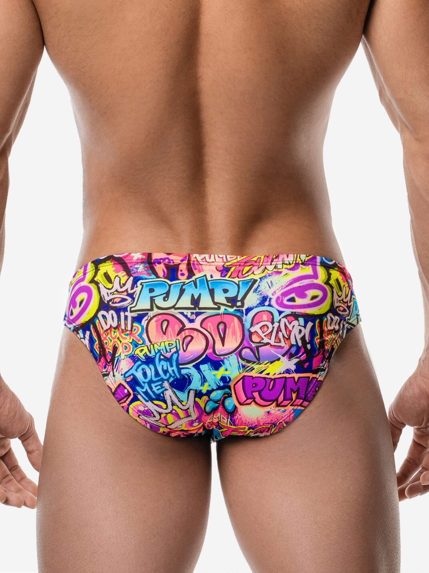 Colorful swim briefs with graffiti-style text on a plain background