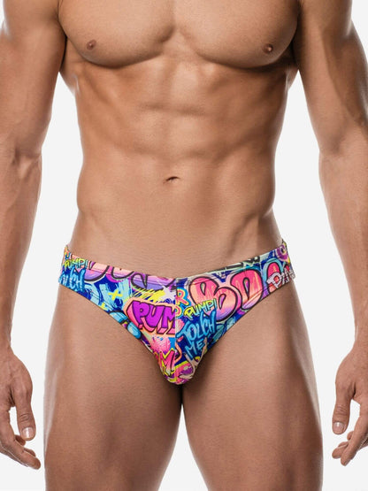 Colorful men's swim briefs with graphic design on a white background