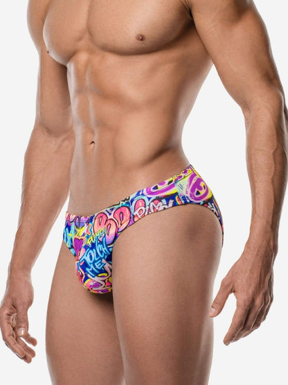Colorful men's swim briefs on a white background