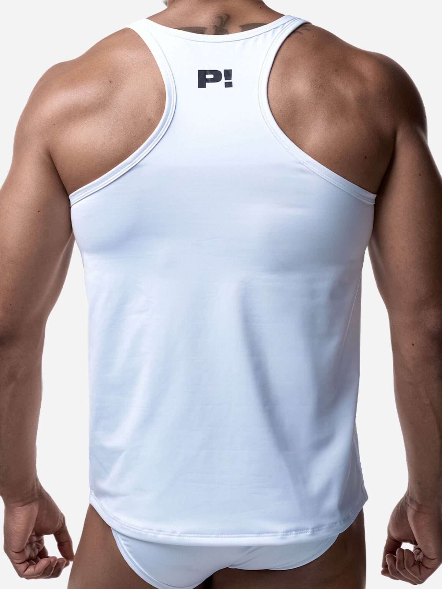Person wearing a white tank top with a logo on the back against a white background
