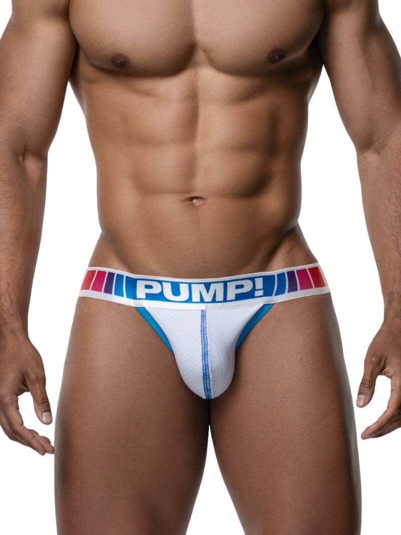 Man wearing a white jockstrap with 'PUMP!' branding on a plain background