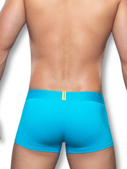 Blue boxer briefs worn by a person on a white background