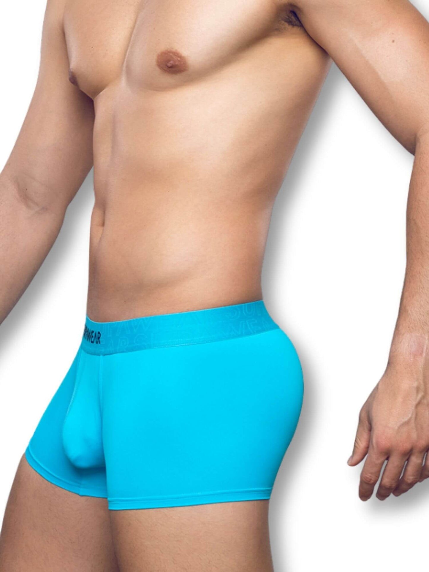 Man wearing bright blue boxer briefs on a white background