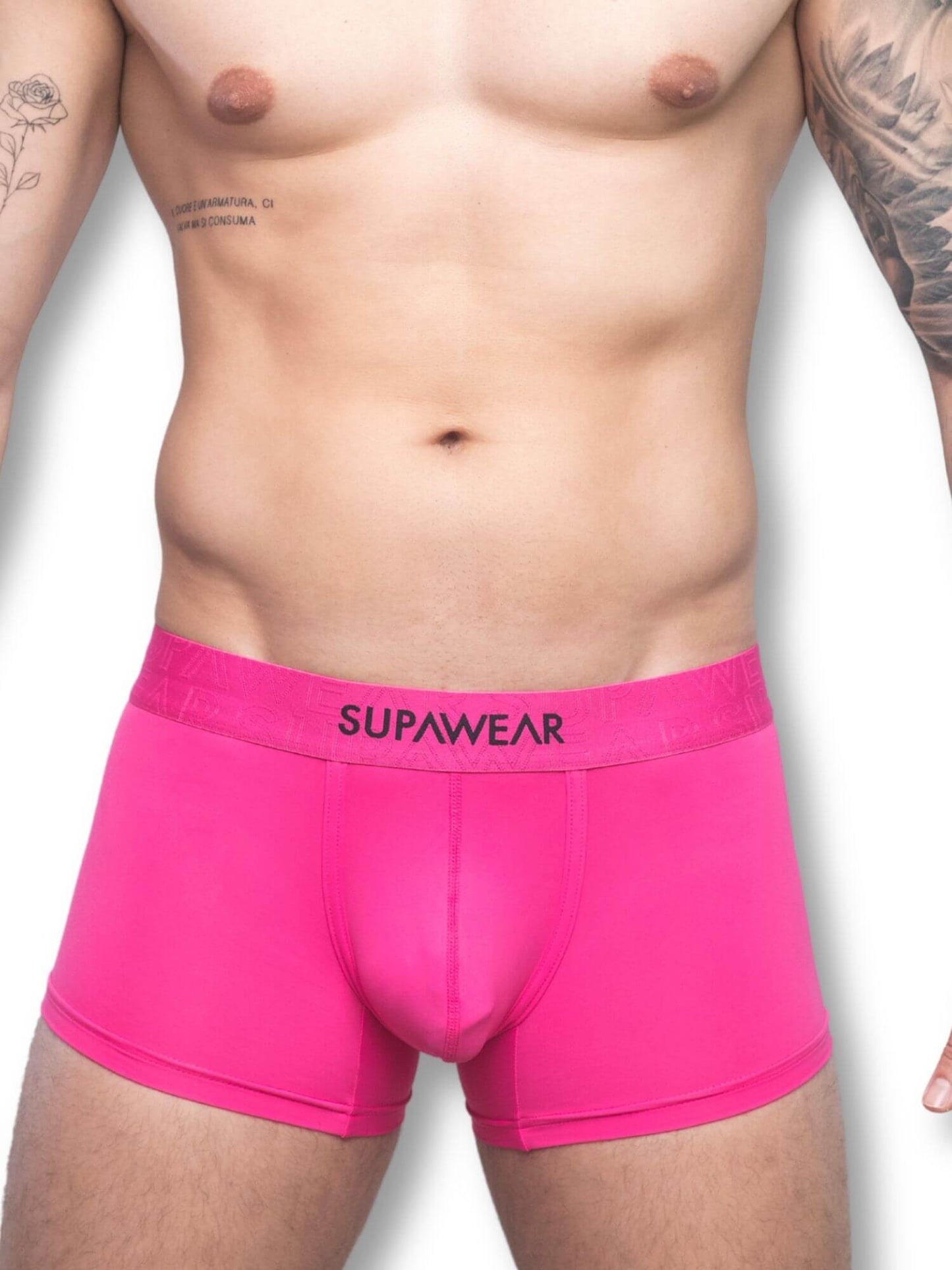 Person wearing bright pink boxer briefs with 'Supawear' branding on a white background