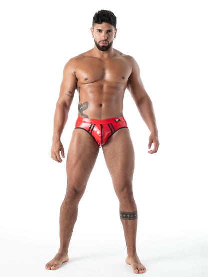 Man wearing red  latex underwear  on a white background