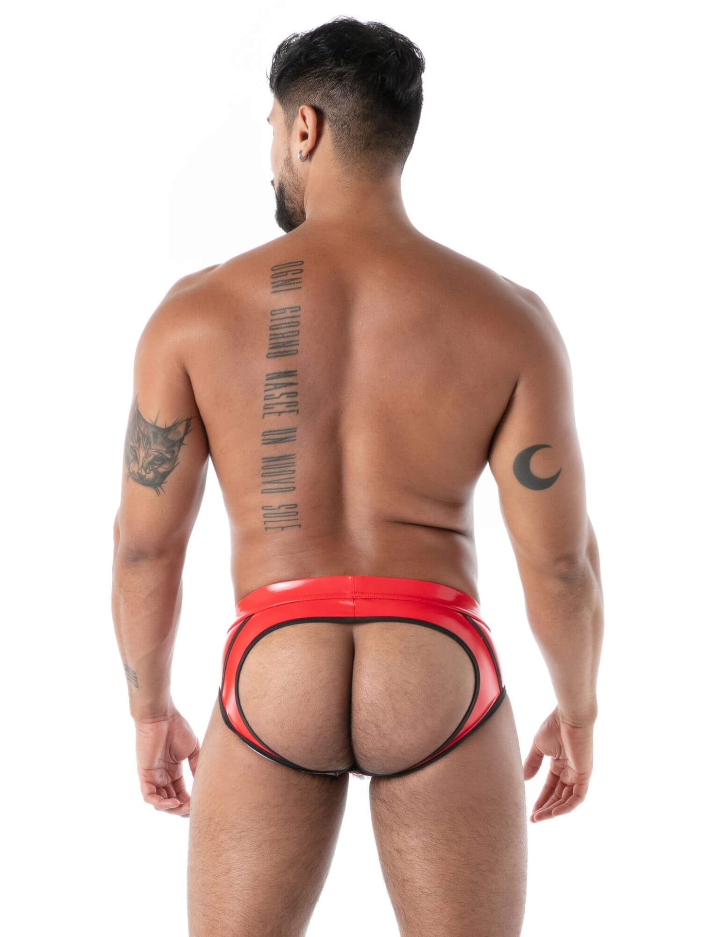 Man wearing red latex underwear on a white background