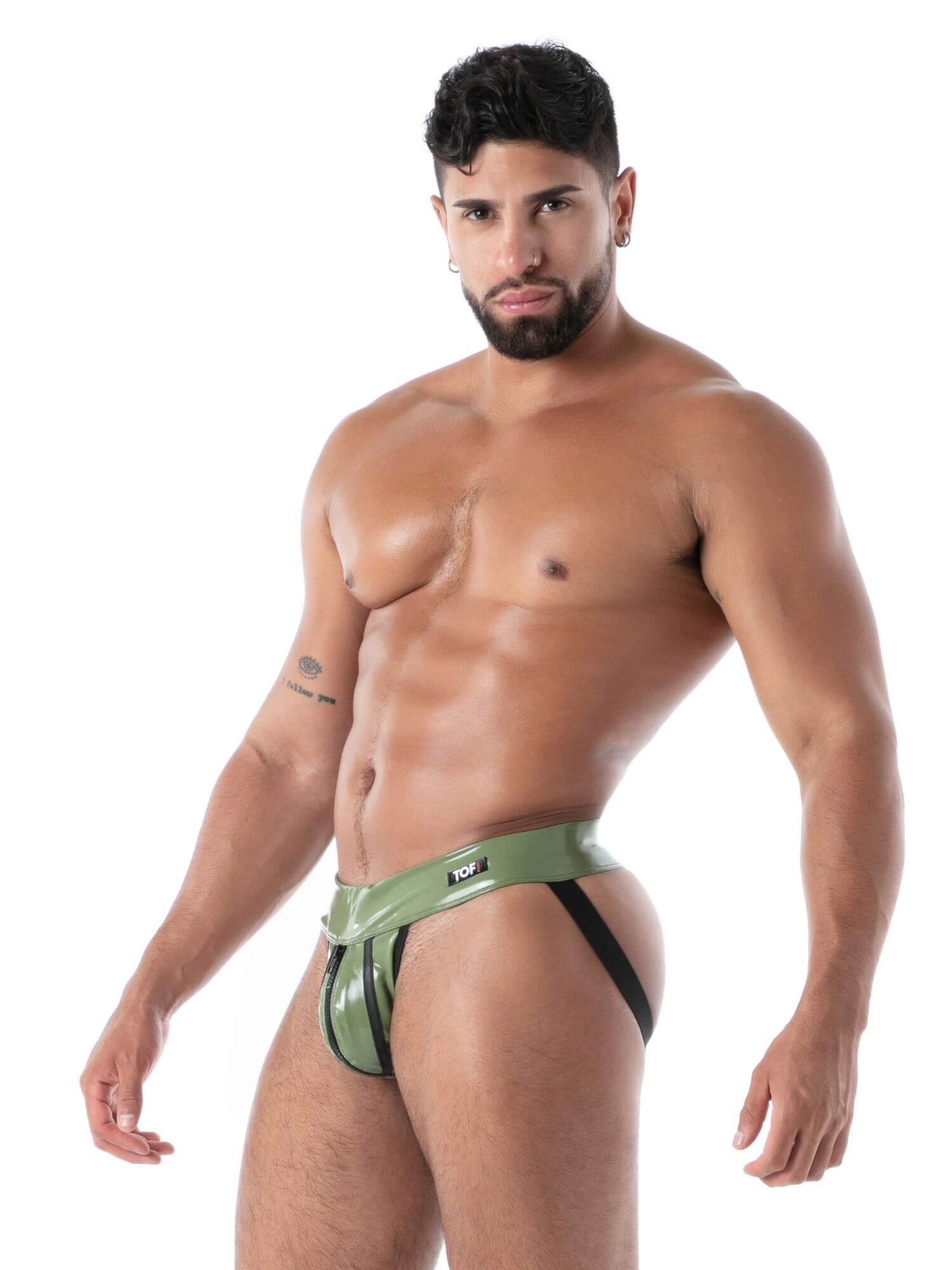 Man wearing a green men's underwear on a white background