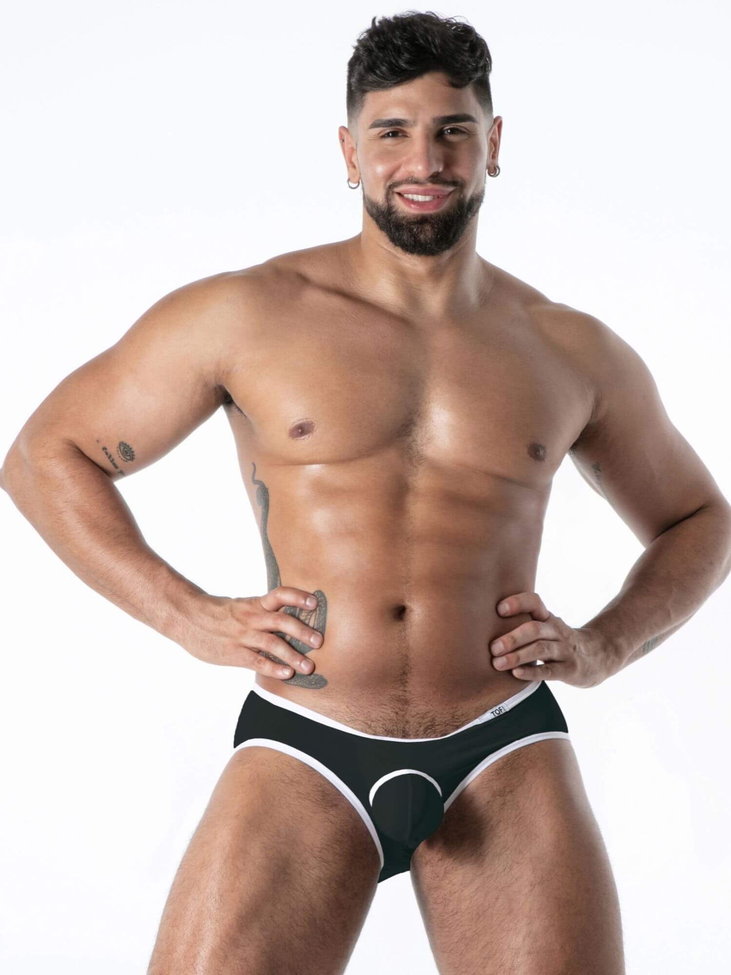 Man wearing black underwear on a white background