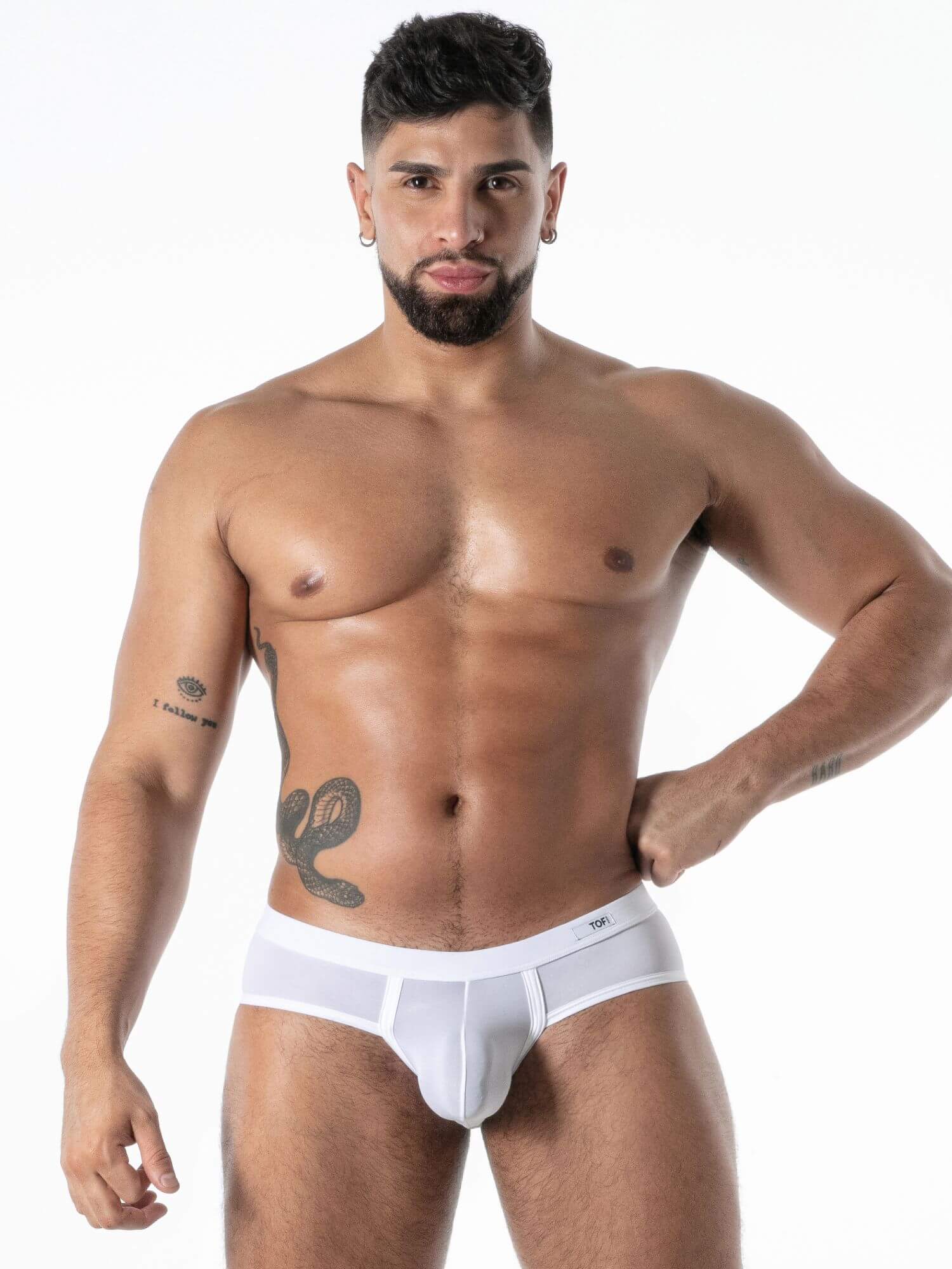 Man wearing a white underwear on a white background