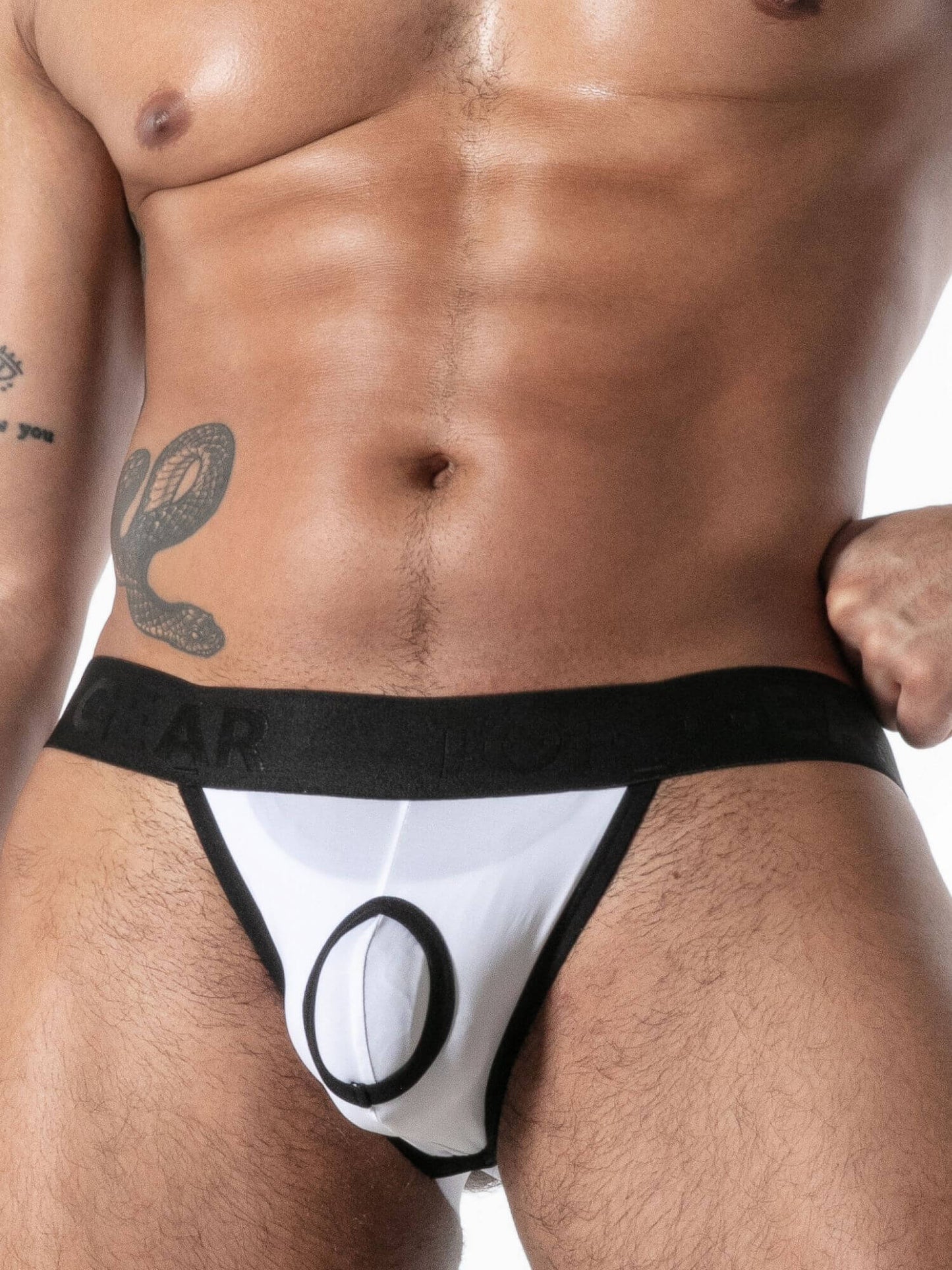 Man wearing a black and white men's underwear on a white background