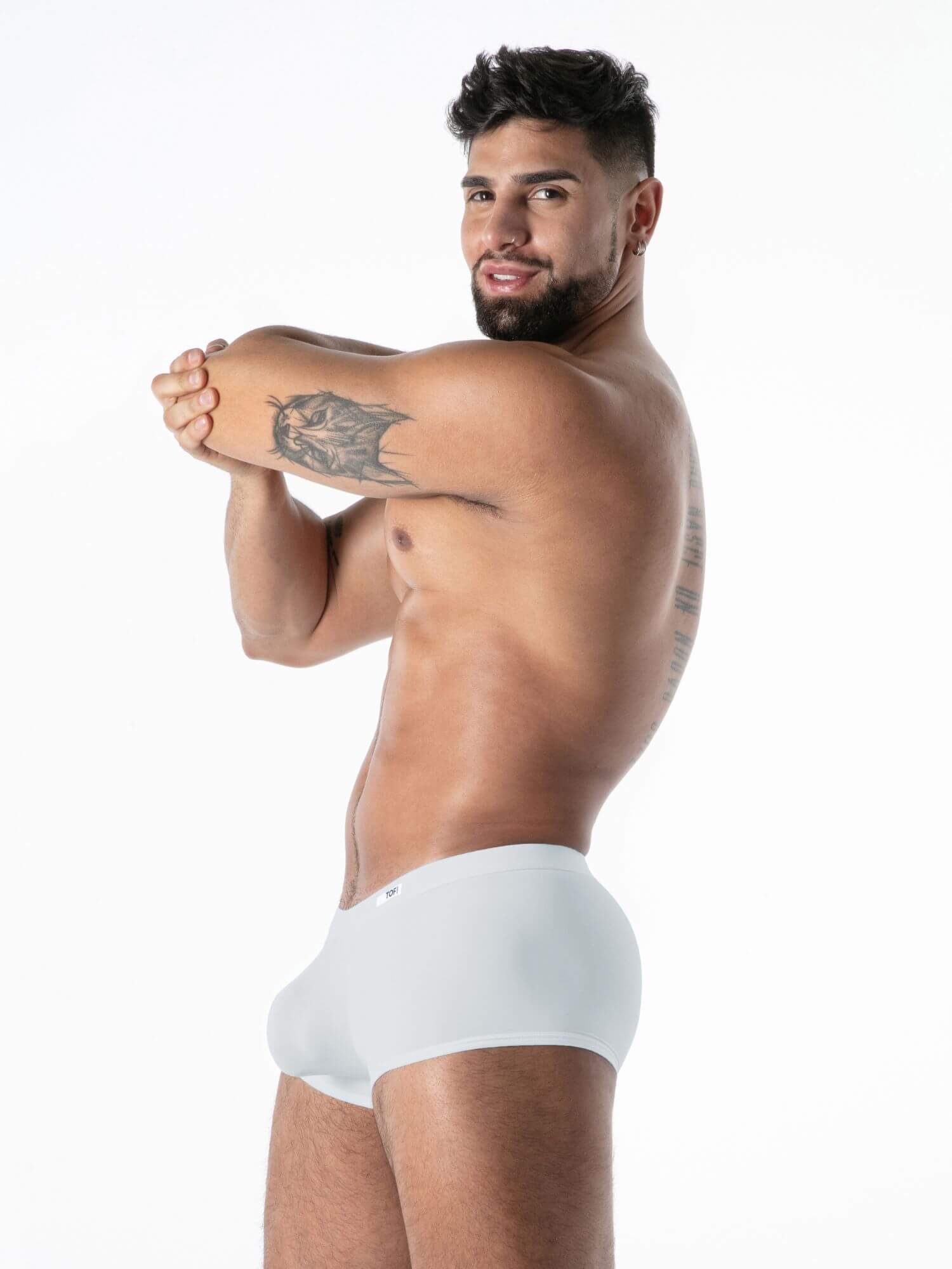 Man wearing a white underwear on a white background