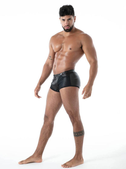Man wearing black underwear on a white background