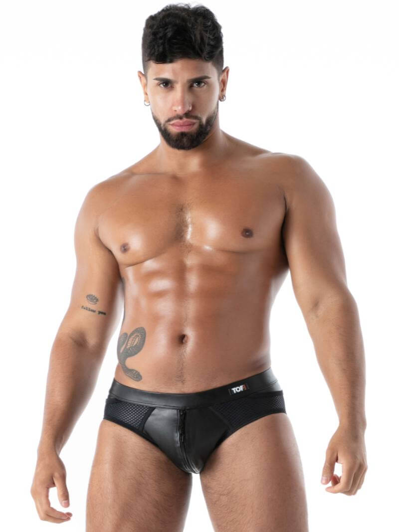Man wearing black underwear on a white background