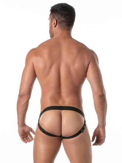 Man wearing a black leather jockstrap on a white background
