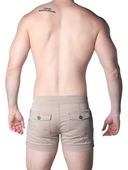 Man wearing beige shorts on a white background