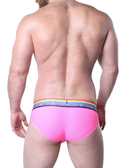 Man wearing pink underwear with rainbow waistband on a white background