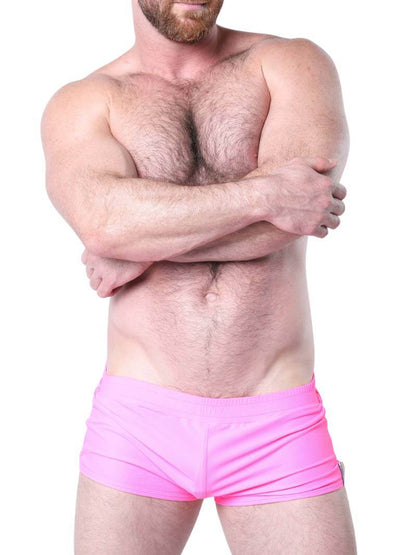 Man wearing blue underwear with mesh panels on a white background