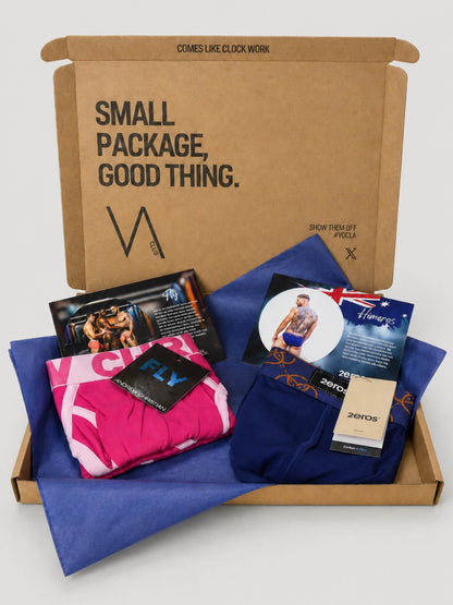 An example of the VA Club men's underwear subscription box service by VOCLA with two underwear products and product cards in a branded cardboard box