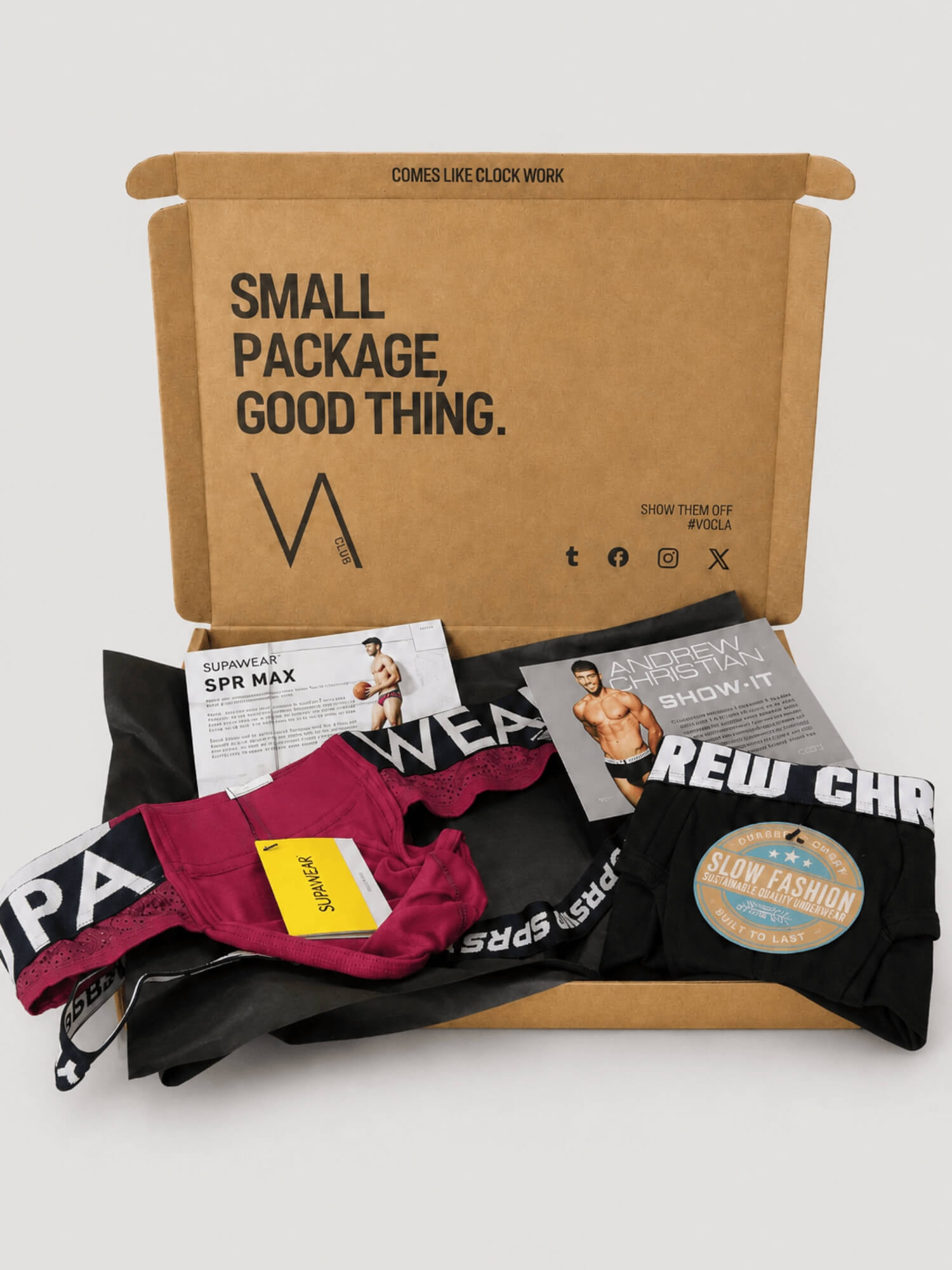 An example of the VA Club men's underwear subscription box service by VOCLA with two underwear products and product cards in a branded cardboard box