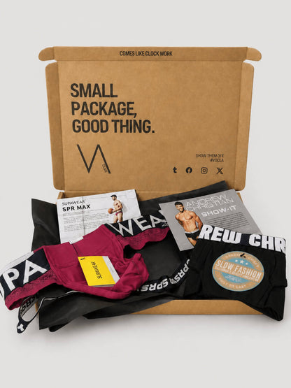 An example of the VA Club men's underwear subscription box service by VOCLA with two underwear products and product cards in a branded cardboard box