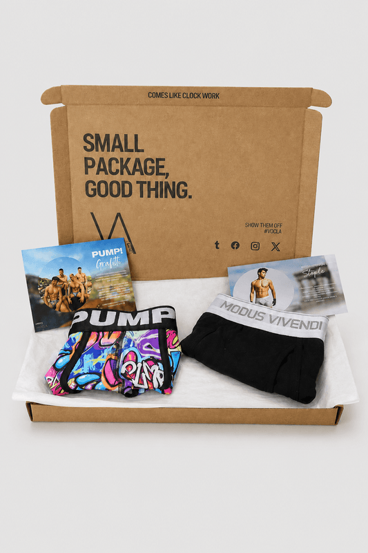 An example of the VA Club men's underwear subscription box service by VOCLA with two underwear products and product cards in a branded cardboard box