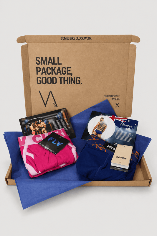 An example of the VA Club men's underwear subscription box service by VOCLA with two underwear products and product cards in a branded cardboard box