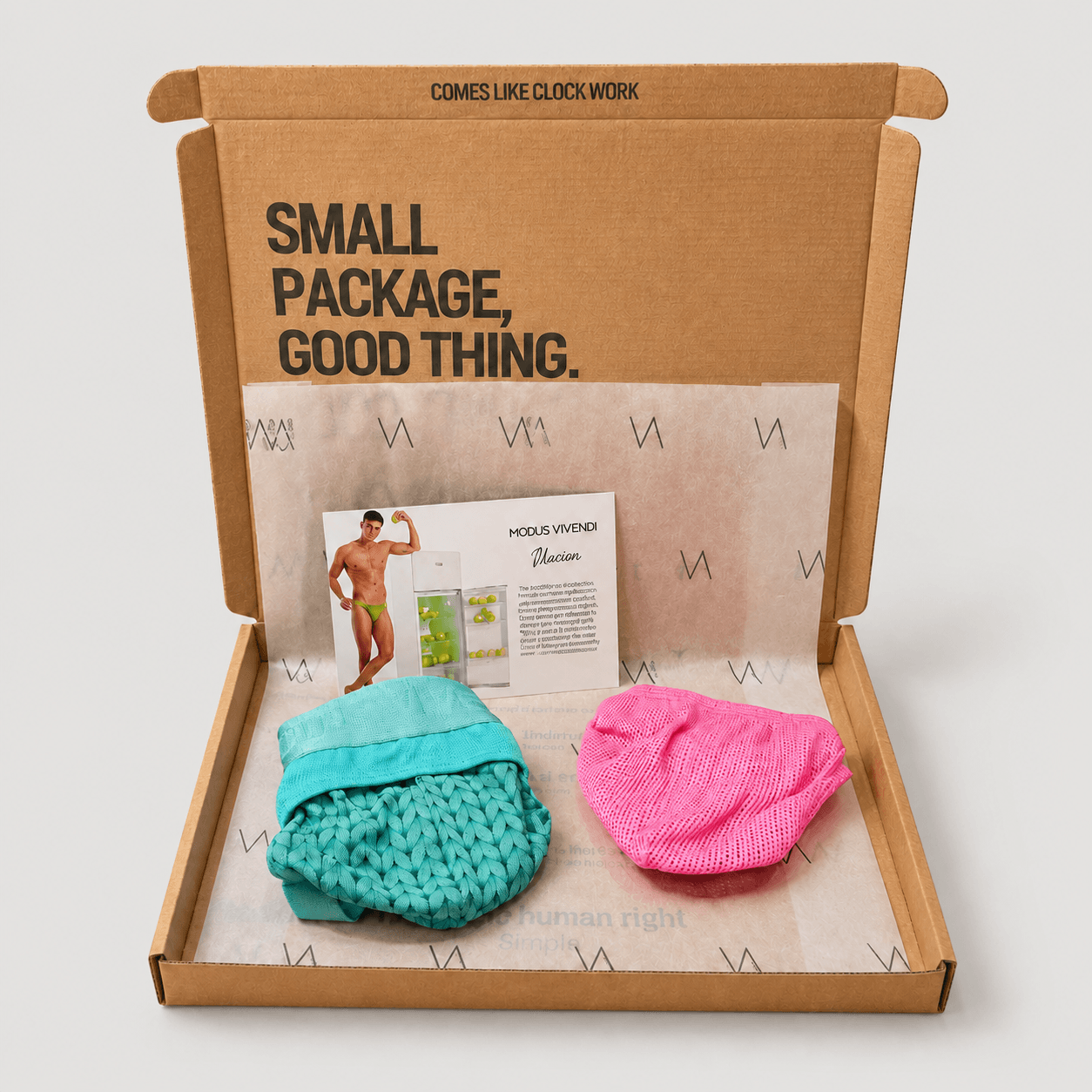 An example of the VA Club men's underwear subscription box service by VOCLA with two underwear products and product cards in a branded cardboard box