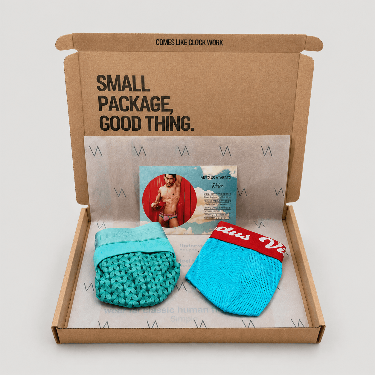 An example of the VA Club men's underwear subscription box service by VOCLA with two underwear products and product cards in a branded cardboard box