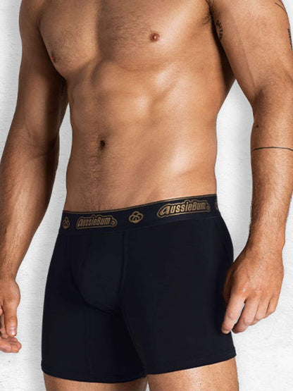 Black boxer briefs with a brand logo on a white background