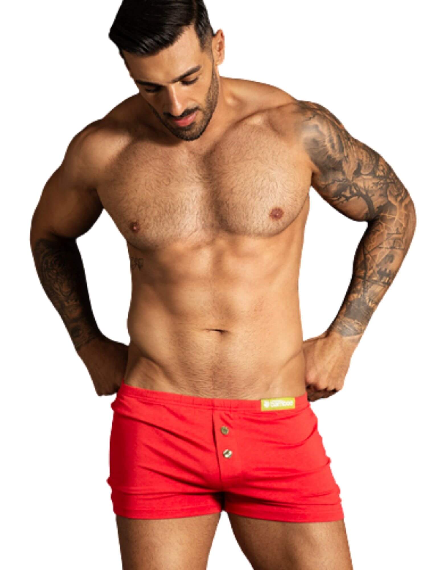 Man wearing red boxer shorts on a white background
