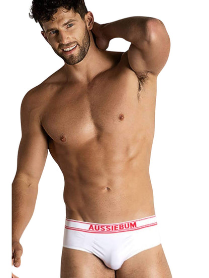 Man wearing white underwear with 'AUSSIEBUM' branding on a white background