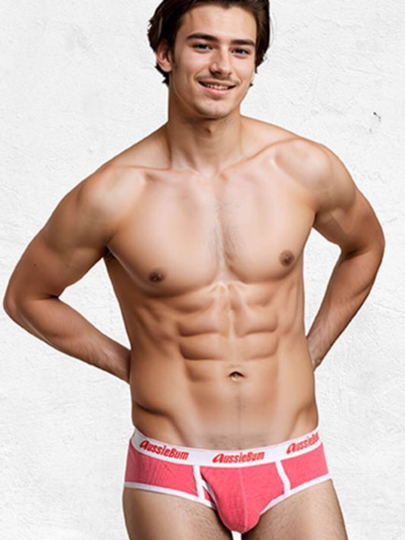 Man wearing a red underwear with 'Assimil' branding on a white background