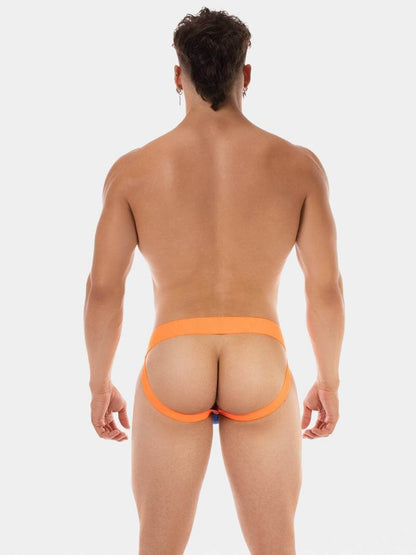 Man wearing an orange men's underwear on a white background