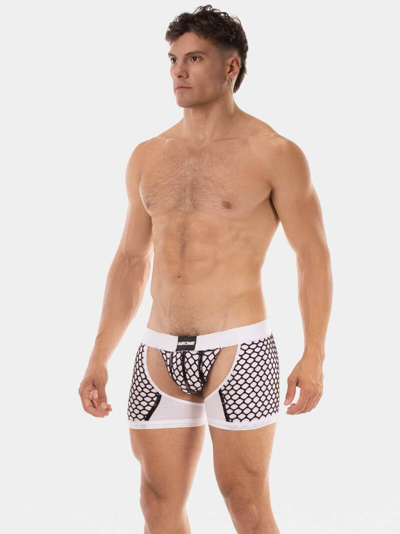 Man wearing a white underwear with black mesh design on a white background