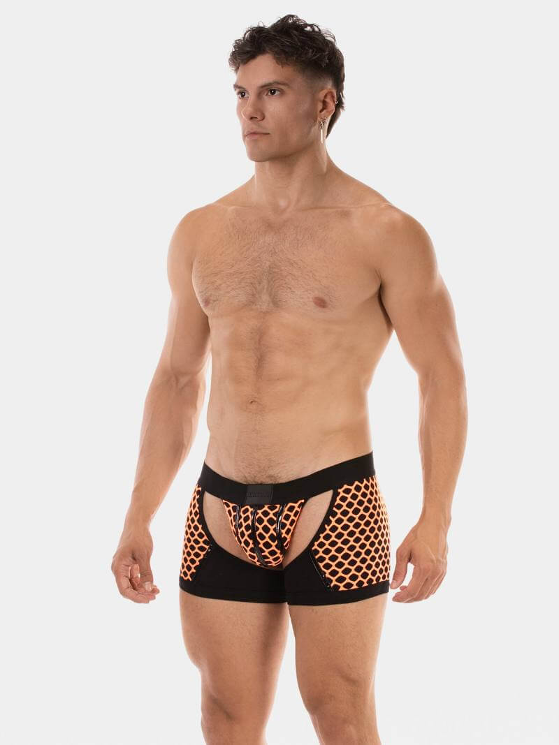Man wearing black and orange patterned underwear on a white background